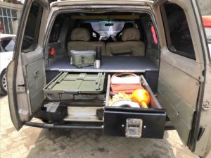 Nissan patrol Y61 twin drawer system with folding table extended and one drawer open