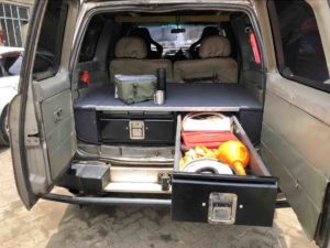 Nissan patrol Y61 twin drawer system with folding table, one drawer extended