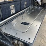 tailgate storage compartment