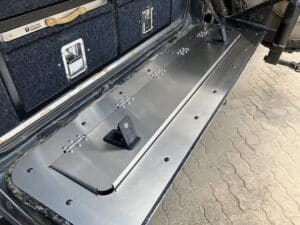 80 series tailgate storage with the handles open